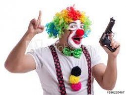 Funny clown with a gun pistol isolated on white background Stock Photo |  Adobe Stock