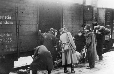 Jews from Krakow forced onto trains heading to Belzec.jpg