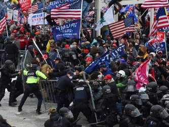 crowds-push-at-barricades-e50f7afab1a1eb8e8da9069639dc287dba587da0.jpg