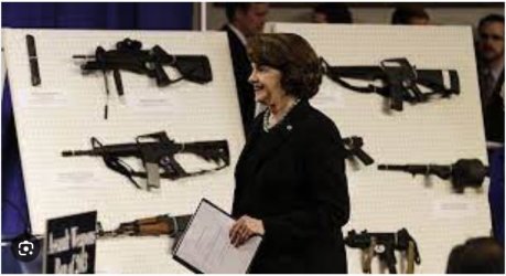 Diane Feinstein with dreaded assault weapons in the Senate.JPG