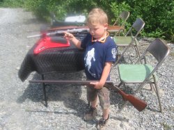 Mason with Iver Johnson 12 Gauge.JPG